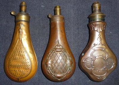 Lot 351 - A Copper Powder Flask, the trefoil body embossed with quatrefoil panels of diapering pendant...