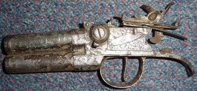 Lot 401 - An 18th Century Double Barrel Flintlock Tap Action Pocket Pistol, in relic condition, the 5.5cm...