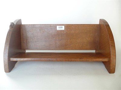 Lot 1228 - A Robert "Mouseman" Thompson Oak Book Trough, with carved mouse signature, 46cm long (post 1955)