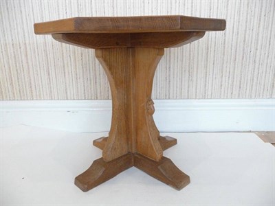 Lot 1229 - A Robert "Mouseman" Thompson Oak Octagonal Coffee Table, on a cruiform base, with carved mouse...