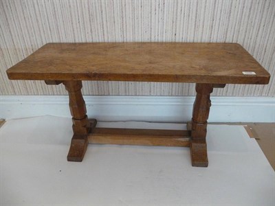 Lot 1236 - A Robert "Mouseman" Thompson Oak Rectangular Coffee Table, on two octagonal legs joined by a...