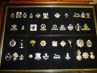 Lot 61 - A Collection of Seventy British Regimental Cap Badges, in brass and white metal, restrikes; a small