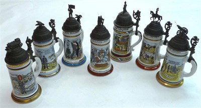 Lot 66 - A Collection of Seven German `Military' Beersteins, late 20th Century, each depicting scenes...