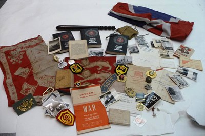 Lot 110 - Militaria, including a REME hardwood writing slope, badges, flags, a truncheon, photographs and...