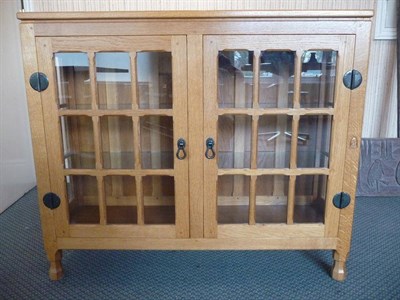 Lot 1244 - An Old Mill Glazed Panelled Oak Display Cabinet, with glazed sides and two glazed doors...