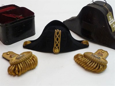 Lot 129 - A Royal Naval Reserve Black Silk Bicorn Hat,  with black oak leaf and acorn jacquard ribbon...