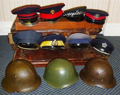 Lot 133 - A Peaked Cap to an Officer of the Grenadier Guards, seven various other peaked caps; a...