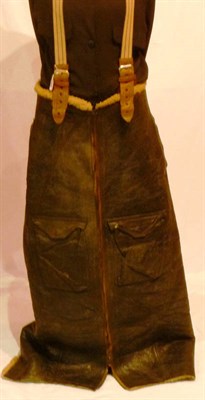 Lot 141 - A Pair of Second World War Sheepskin Lined Leather Flying? Trousers, with unusual zip closure,...