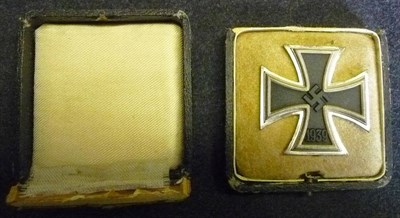 Lot 152 - A German Third Reich Iron Cross, First Class, the sword shape pin stamped 65, in box of issue...