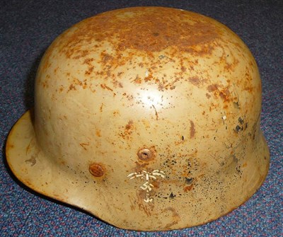 Lot 160 - A German Third Reich M35 Helmet, painted beige and with single Afrika Korps deca, folded rim,...