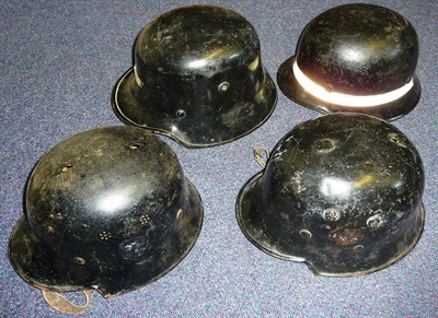 Lot 163 - A German Third Reich Fire Police Helmet, with domed pierced salt shaker type rivets, plugged...