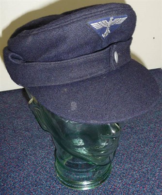 Lot 175 - A Teno Blue Wool Field Cap, with aluminium button and embroidered cloth cap insignia