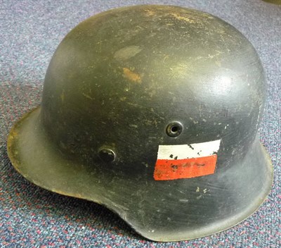 Lot 178 - A Second World War German M42 Helmet, with two repainted decals to the Polish Resistance, with...