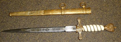 Lot 186 - A German Third Reich Naval Dirk, the 25cm double fullered  blade etched with fouled anchor and with