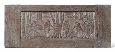 Lot 1251 - An Arts and Crafts Carved Oak Panel, by O.T. Keeling, carved with four ravens stood by tree...