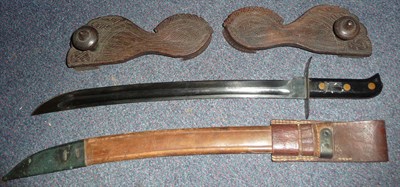 Lot 198 - A Japanese Second World War Boarding Cutlass, the 44cm single edge blackened steel blade with a...