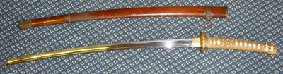 Lot 205 - A Japanese Second World War Army Officer's Katana, the unsigned 65cm steel blade with unusual...