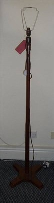 Lot 1256 - A Cotswold School Walnut Standard Lamp, octagonal column, on cruciform base, unmarked,...