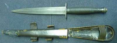 Lot 249 - A Third Pattern Commando Knife, with machine forged steel blade, the crossguard stamped William...