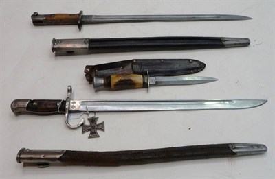 Lot 255 - A Japanese "Type 30" Arisaka Bayonet, the blade with entwined dolphin and diamond marks for...