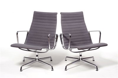 Lot 1258 - A Pair of Aluminium Group Arm Chairs, designed by Charles and Ray Eames, Model No.EA116, the...