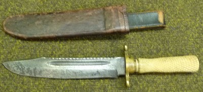 Lot 268 - A Bowie Knife, with 20cm fullered clip-point steel blade, brass crossguard with recurving quillons