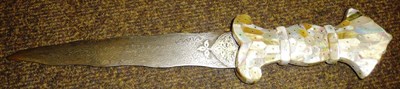 Lot 269 - An Indian Dagger, with slightly wavy damascened steel blade and mother of pearl veneered grip.