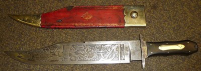 Lot 272 - A Bowie Knife, the 30cm clip-point steel blade etched on one side with a stag hunting scene,...