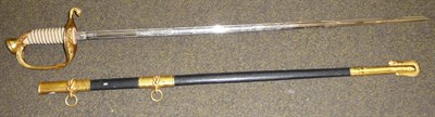 Lot 276 - A US Naval Officer's Sword, the 73cm Spanish single edge fullered steel blade etched with...