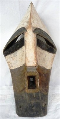 Lot 338 - A Songye Kifwebe Mask, of female form, with slightly raised medial ridge running down the domed...