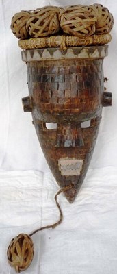 Lot 339 - A Salampasu Mask, with domed forehead, recessed square pierced eyes, rounded triangular nose...