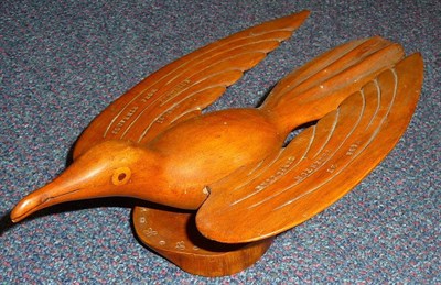 Lot 351 - A Pitcairn Islands Carved Wooden Bird, the detachable outspread wings carved "Made by Thornton...