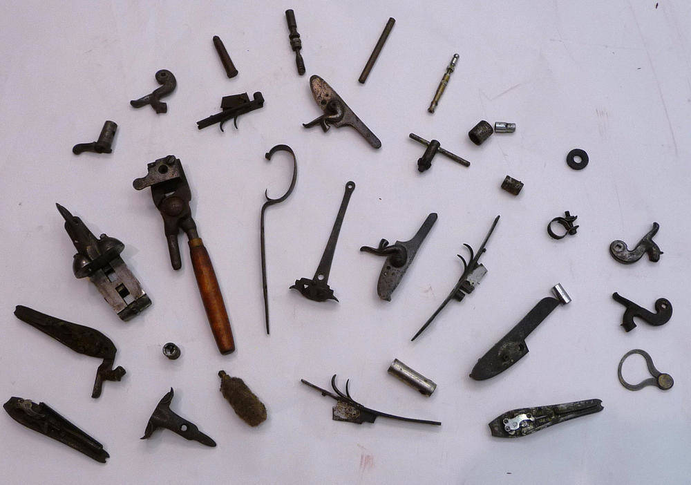 Lot 386 - A Quantity of Gun Parts and Accessories, including trigger guards, lock plates and mechanisms,...
