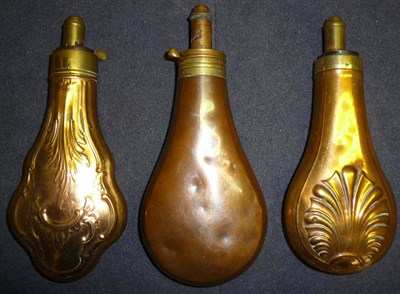 Lot 392 - A Sykes' Patent Heavy Copper Powder Flask, of plain form, with brass charger; a Copper Powder Flask