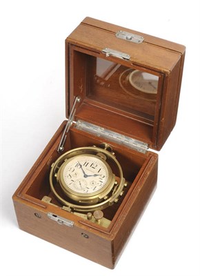 Lot 1278 - A Deck Watch with Eight Day Duration, signed Waltham Watch Co, circa 1940, three tier case,...