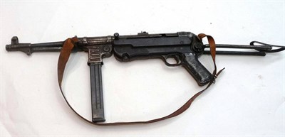 Lot 481 - A Deactivated Schmeisser MP40 Submachine Gun, with folding stock, the back of the action...