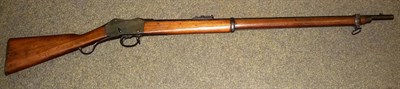 Lot 491 - A Martini Henry Mark III Rifle, the 85cm steel barrel with various proof marks, hinged ladder...