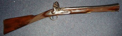 Lot 493 - An Early 19th Century East India Company Flintlock Blunderbuss, the 44.5cm polished brass...