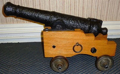 Lot 499 - A 19th Century Black Painted Cast Iron Naval Cannon, double ring knopped barrel with rounded...