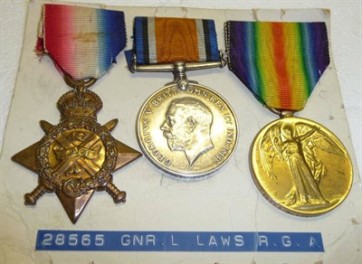 Lot 42 - A First World War Trio, awarded to 28585 GNR:L.LAWS, R.G.A., comprising 1914 Star, British War...