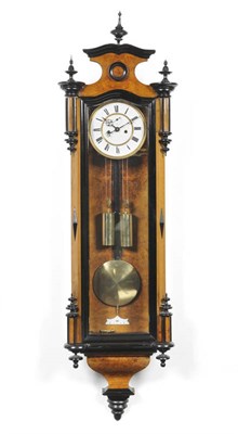 Lot 1290 - A "Vienna" Wall Clock, circa 1890, the walnut veneered and ebonised case with turned finials...