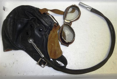 Lot 116 - A British Leather Flying Helmet and Goggles, by D Lewis Ltd, with attached earphones
