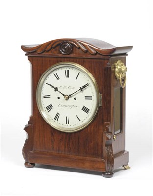 Lot 1295 - A Rosewood Striking Bracket Clock, C H Cox, Leamington, circa 1850, case with arched pediment, lion