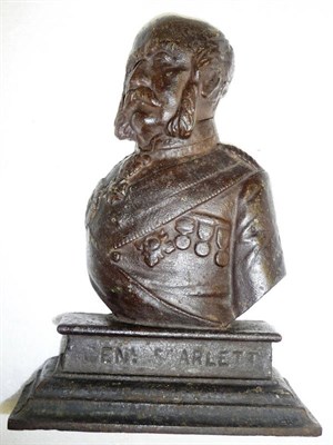 Lot 129 - A Victorian Cast Iron General Scarlett Doorstop, as a half length bust on a stepped rectangular...