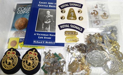 Lot 147 - A Quantity of Militaria, comprising British Military cap badges in brass, white metal and...