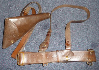Lot 150 - A Brown Leather Sam Browne Belt, with brass buckles and fittings, and a leather revolver holster