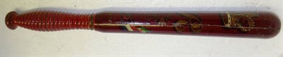 Lot 166 - A Victorian Maroon Painted Wood Truncheon, painted with a crowned VR cypher, crossed standards...
