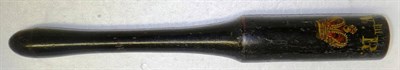 Lot 167 - A William IV Black Painted Wood Truncheon, the flat topped cylindrical head painted with W.IIII...
