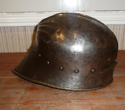 Lot 180 - A Copy of a Medieval Gothic Sallet (Helmet), with double fluted medial ridge, the back extending to