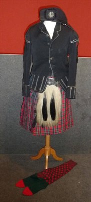 Lot 184 - A Scottish Piper's Uniform, comprising a black tunic with silver bullion thread piping and...
